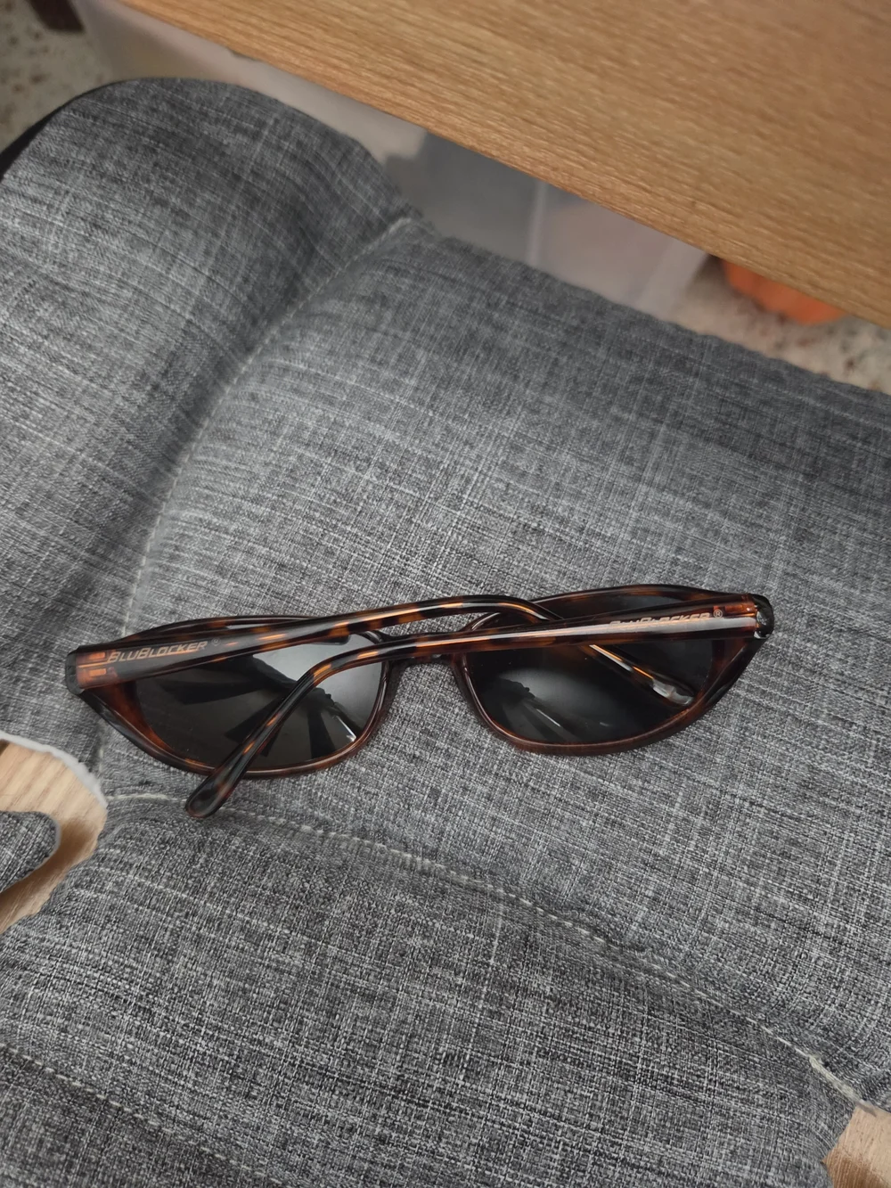 Tortoiseshell Oval Sunglasses with Dark Lenses.  Blue Blocker